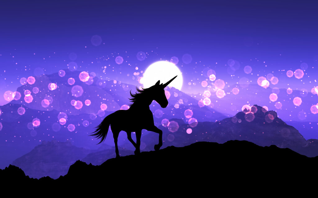 3d fantasy unicorn on a mountain landscape with purple sunset sk